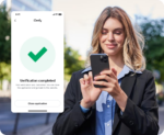 A person completing the identity verification process on her phone.