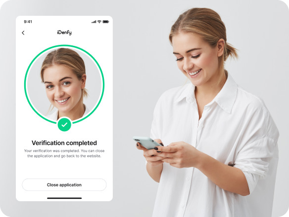 A person completing the identity verification process on her phone.