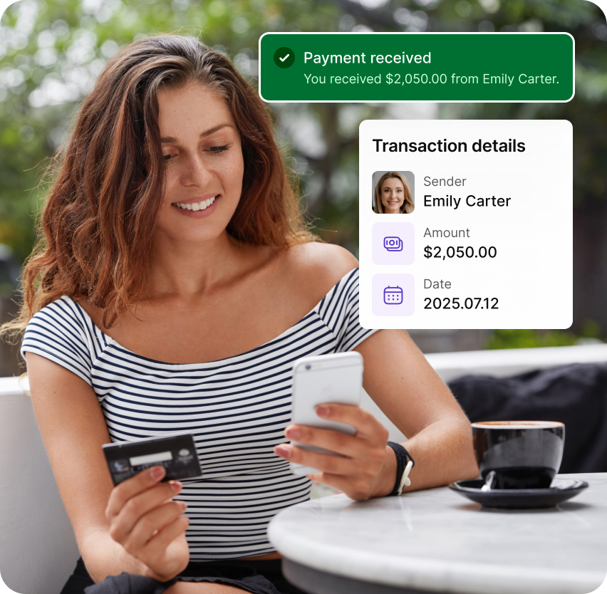 A woman getting a payment from another person.